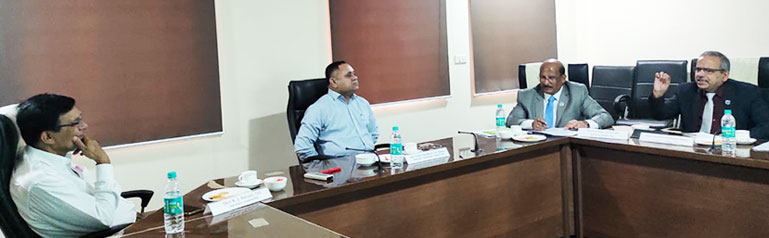 Hon&#39;ble Member Prof. C.S.K. Mishra &amp; Hon&#39;ble Member Er. G.C. Sahu in a discussion with Hon&#39;ble Chairman &amp; Secretary of Gujarat Public Service Commission